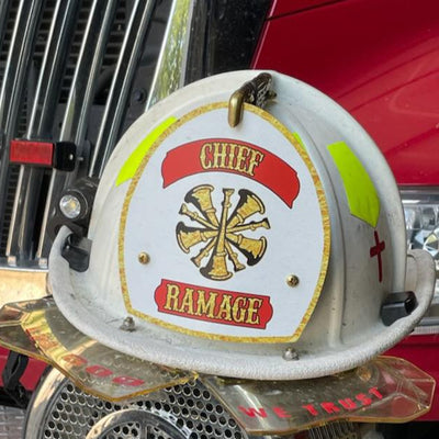 Firefighter helmet and radio on a fire truck