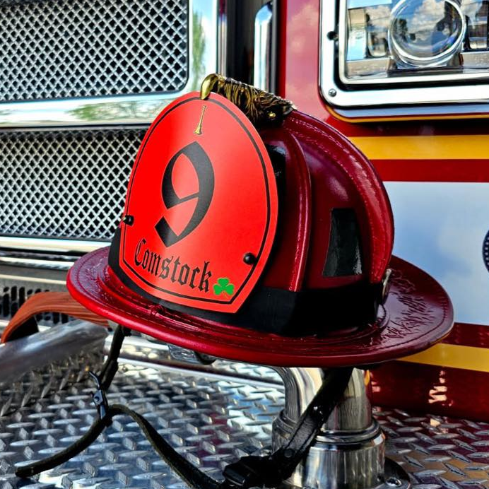 Red fire helmet with &