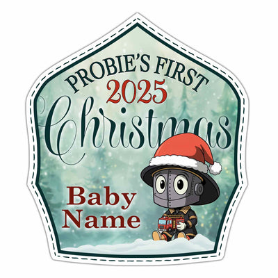 Decorative sign for 'Probie's First Christmas 2025' with a tinman character wearing a Santa hat.